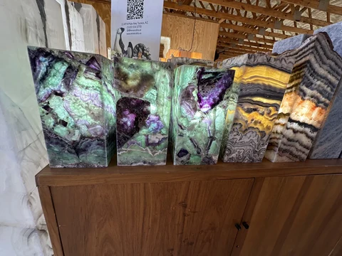 Colorful polished mineral slabs displayed at The Hive
