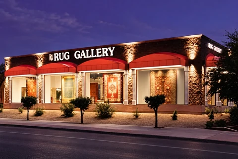 Rug Gallery storefront in Tucson at dusk
